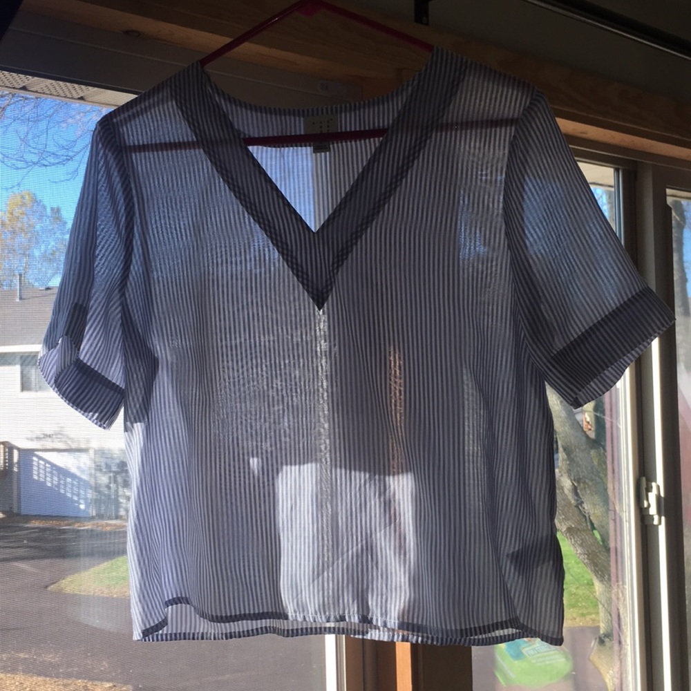 a blue and white striped blouse